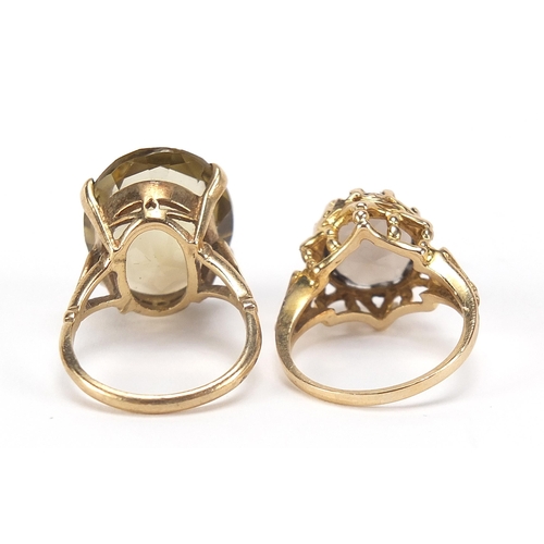 1735 - Two 9ct gold rings set with citrine and smoky quartz, sizes L and M, 10.8g