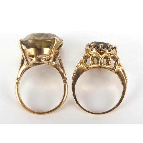 1735 - Two 9ct gold rings set with citrine and smoky quartz, sizes L and M, 10.8g