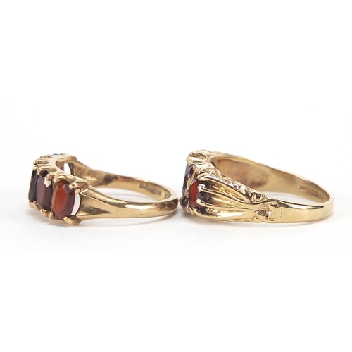 1769 - Two 9ct gold garnet rings, sizes N and O, 6.0g