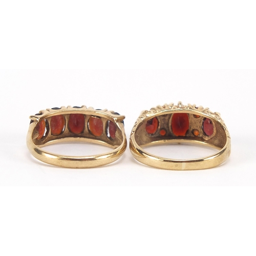 1769 - Two 9ct gold garnet rings, sizes N and O, 6.0g