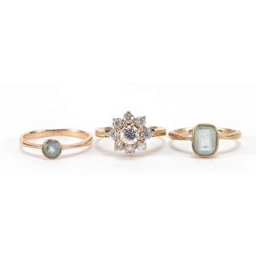 1755 - Three 9ct gold rings comprising two blue stone, possibly aquamarine and cubic zirconia cluster, size... 