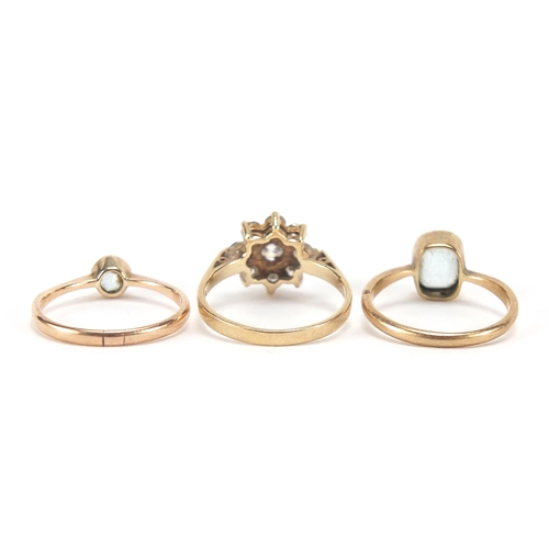 1755 - Three 9ct gold rings comprising two blue stone, possibly aquamarine and cubic zirconia cluster, size... 