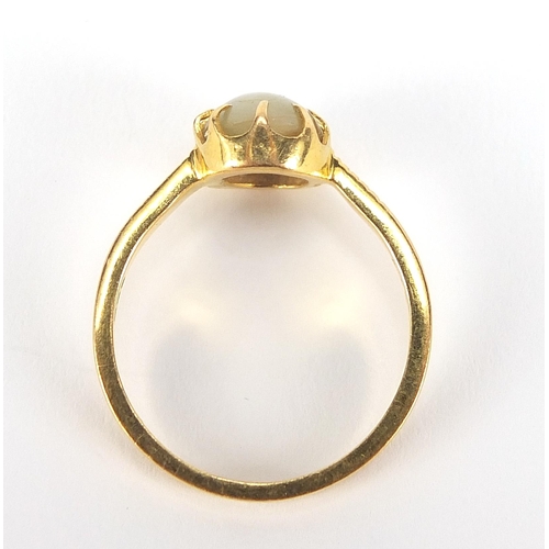 1753 - Gold cabochon cat's eye ring, indistinct marks, (tests as 15ct+ gold) size S, 5.4g