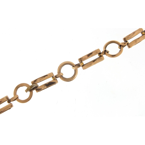 1703 - 9ct gold loop and gate link bracelet, 16cm in length, 5.3g