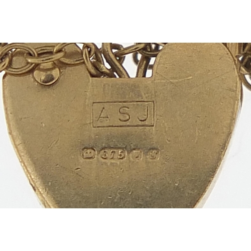 1734 - 9ct gold seven row gate link bracelet with love heart padlock, 18cm in length, 8.2g