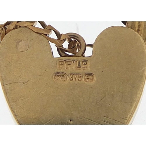 1685 - 9ct gold graduated nine row gate link bracelet with love heart padlock, 18cm in length, 23.6g