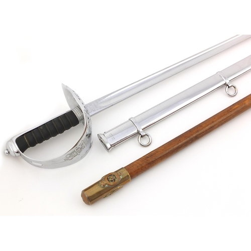 2459 - Military interest Life Guards dress sword by Wilkinson and a swagger style stick with Life Guard bad... 