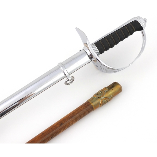 2459 - Military interest Life Guards dress sword by Wilkinson and a swagger style stick with Life Guard bad... 