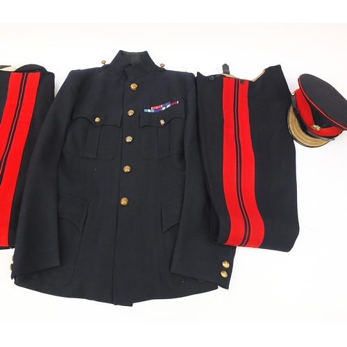 2462A - Two military interest Life Guard's black uniforms with peak cap, shoulder tabs on one uniform holdin... 