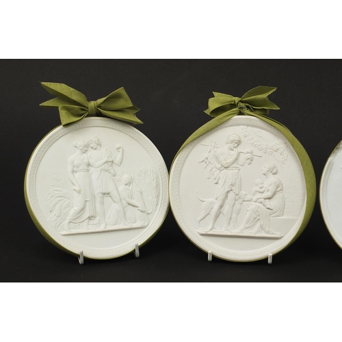 404 - Royal Copenhagen, Four Danish white bisque plaques, each depicting classical scenes, the largest 14.... 