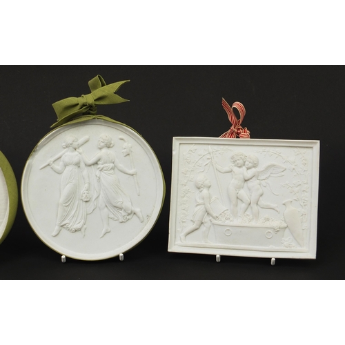 404 - Royal Copenhagen, Four Danish white bisque plaques, each depicting classical scenes, the largest 14.... 