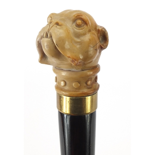 328 - Hardwood walking stick with bulldog design pommel, 92 in length