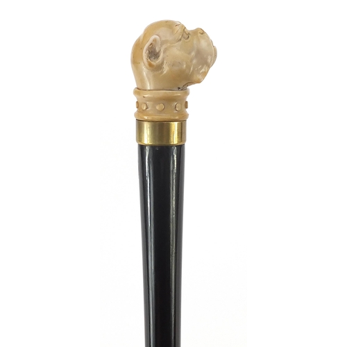 328 - Hardwood walking stick with bulldog design pommel, 92 in length