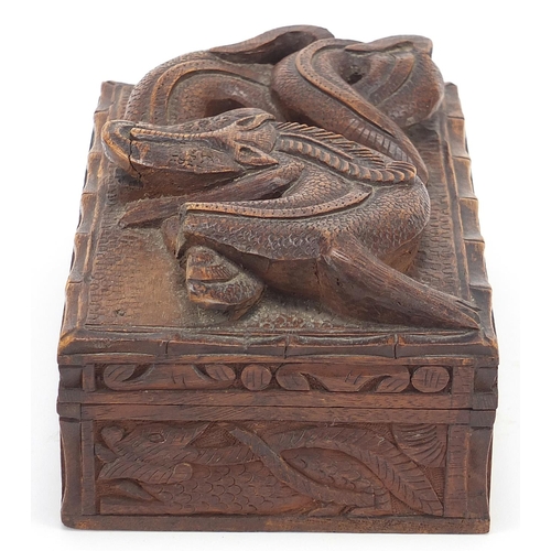 1090 - Chinese hardwood box carved in relief with a mythical animal and dragons, 8.5cm H x 20cm W x 12.5cm ... 