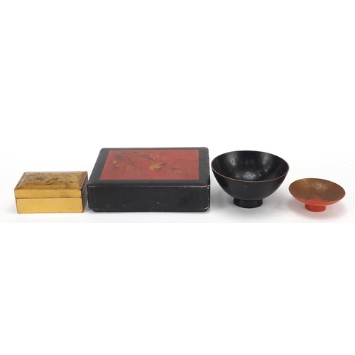 79 - Five Japanese lacquered boxes and bowls, including one bowl decorated with koi carp, the largest 4.5... 