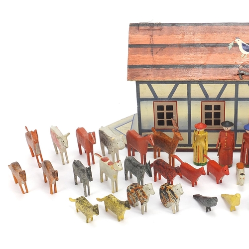 334 - Old wooden Noah's ark with carved woodens animals including horses, 33cm in length