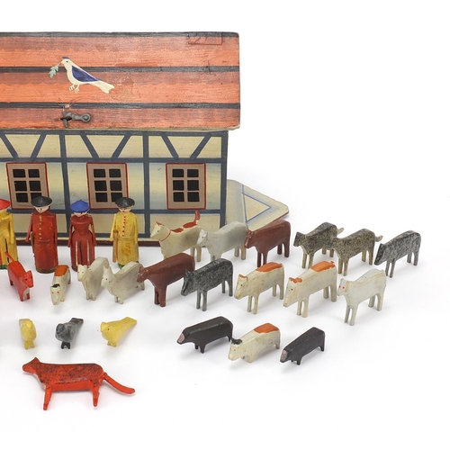 334 - Old wooden Noah's ark with carved woodens animals including horses, 33cm in length