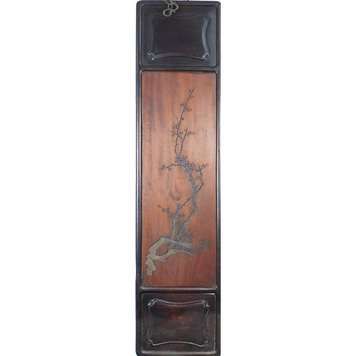 106 - Set of four Chinese hardwood panels carved with calligraphy and flowers, each 106cm x 25.5cm