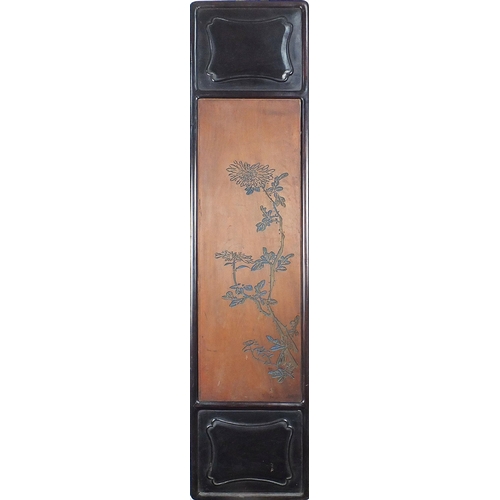 106 - Set of four Chinese hardwood panels carved with calligraphy and flowers, each 106cm x 25.5cm