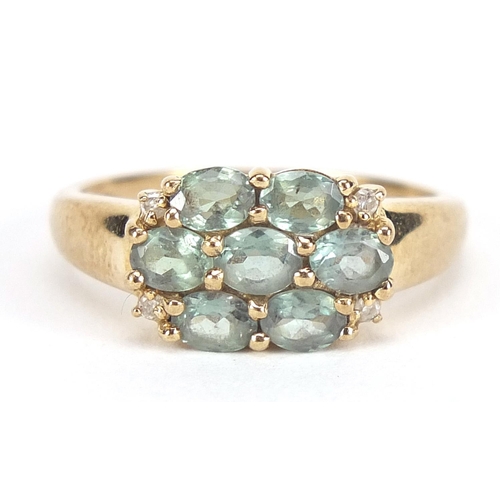 1723 - 9ct gold green stone and diamond cluster ring, size N, 2.8g