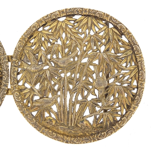 71A - Chinese silver gilt two piece buckle, pierced and embossed with birds amongst bamboo grove, possibly... 