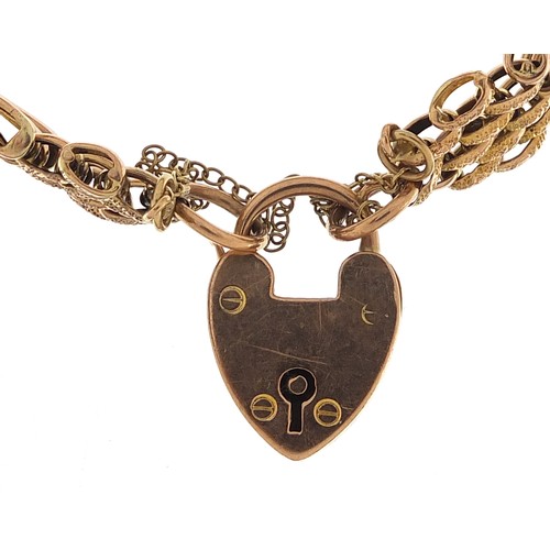 1746 - Victorian 9ct rose gold four row gate link bracelet with love heart padlock, 14cm in length, 11.6g