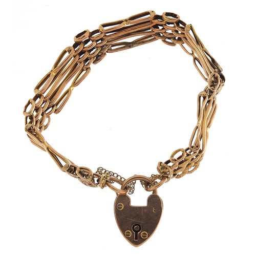 1746 - Victorian 9ct rose gold four row gate link bracelet with love heart padlock, 14cm in length, 11.6g