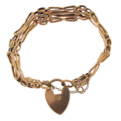 1746 - Victorian 9ct rose gold four row gate link bracelet with love heart padlock, 14cm in length, 11.6g