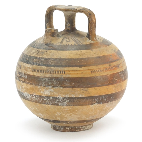 124 - Mycenaean pottery stirrup jar, 14.5cm high