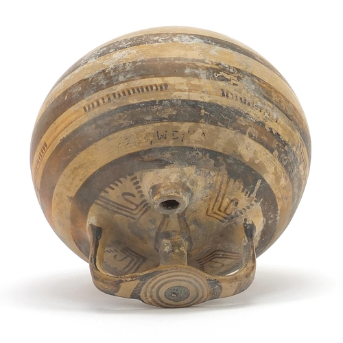 124 - Mycenaean pottery stirrup jar, 14.5cm high