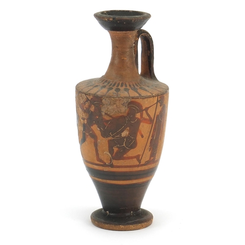 136 - Attic pottery lekythos hand painted with warriors fighting before an onlooker, 12cm high