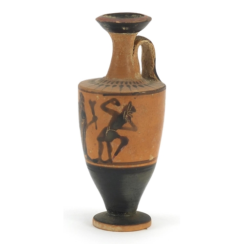 137 - Attic pottery lekythos hand painted with black figures, 11cm high