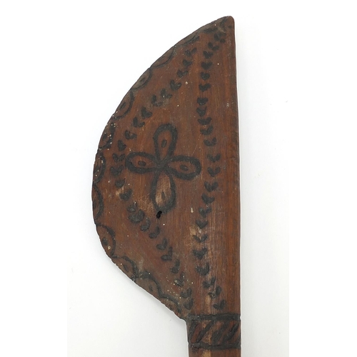 184 - Tribal interest carved wooden paddle possibly Polynesian, 44cm in length