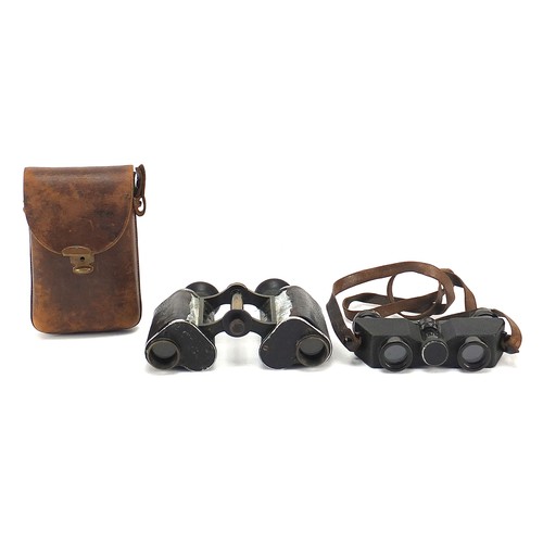 2453 - Two pairs of military interest Carl Zeiss binoculars, one with case