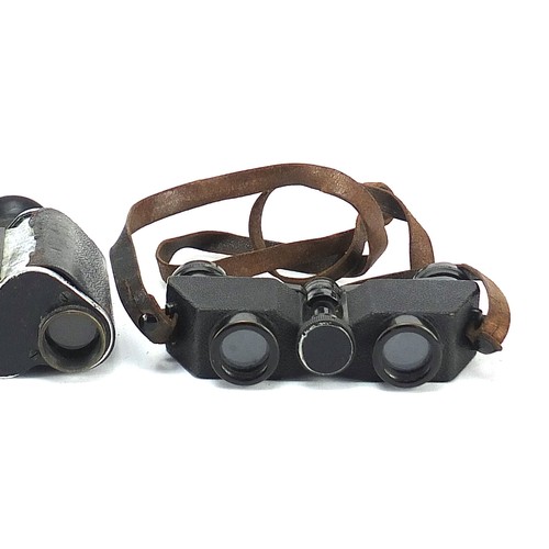 2453 - Two pairs of military interest Carl Zeiss binoculars, one with case