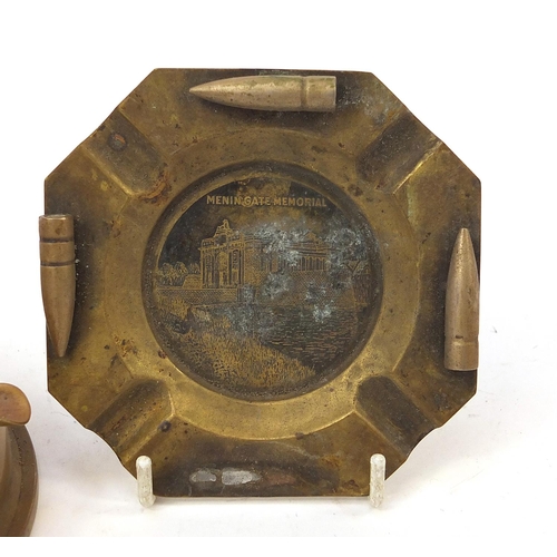 2461 - Trench art comprising a combination ashtray lighter and ashtray with a view of Meningate Memorial, t... 