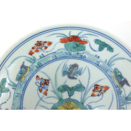5 - Chinese porcelain doucai dish hand painted with ducks amongst aquatic life, six figure character mar... 