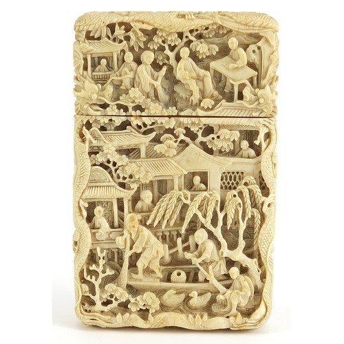 35 - Chinese Canton ivory card case finely and deeply carved with figures amongst pagodas, 10.5cm H x 6.5... 