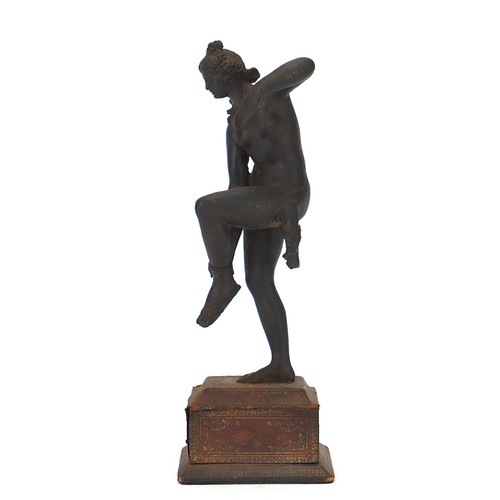 217 - Antique cast metal figure of a nude female raised on a rectangular base with tooled leather mounts, ... 