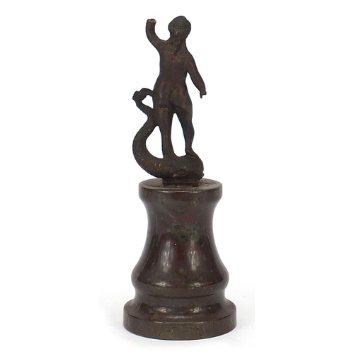 220 - Antique patinated bronze figure of a nude female upon a dolphin, raised on a marble base, possibly G... 