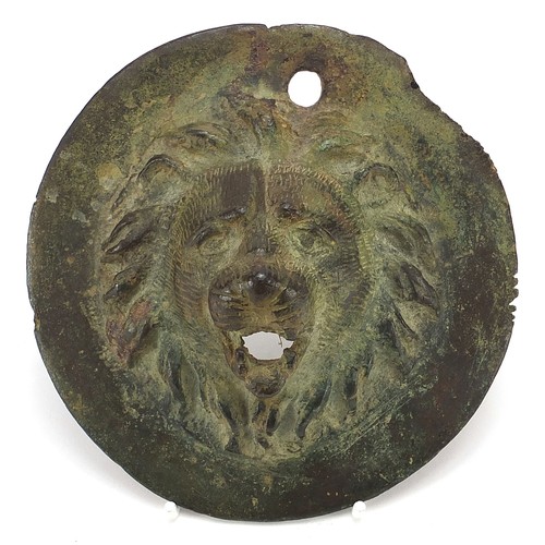 234 - Antique patinated bronze lion head water feature, possibly Roman, 14.5cm in diameter