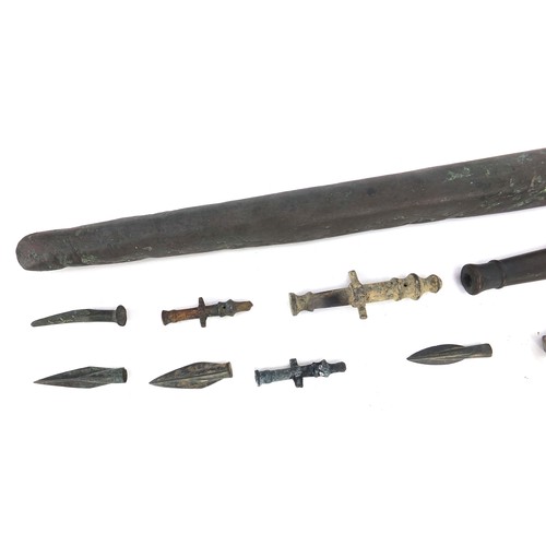 170 - Metal antiquities including spear heads and cannon barrels, the largest 27cm in length