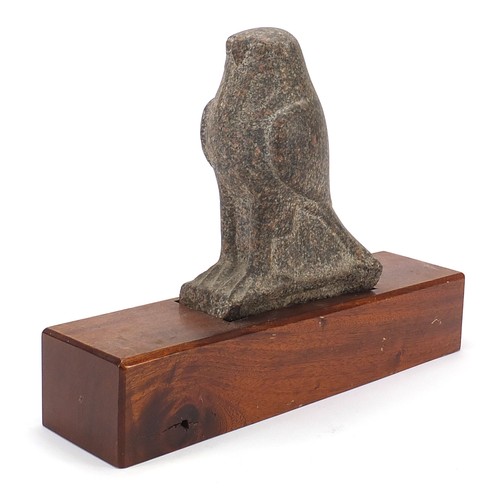 160 - Large antique stone carving of a bird raised on a later wooden base, possibly Egyptian, 30cm high