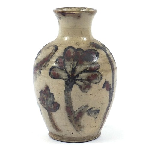 393 - Large studio pottery vase hand painted with flowers, impressed marks to the base, 29cm high