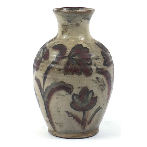 393 - Large studio pottery vase hand painted with flowers, impressed marks to the base, 29cm high