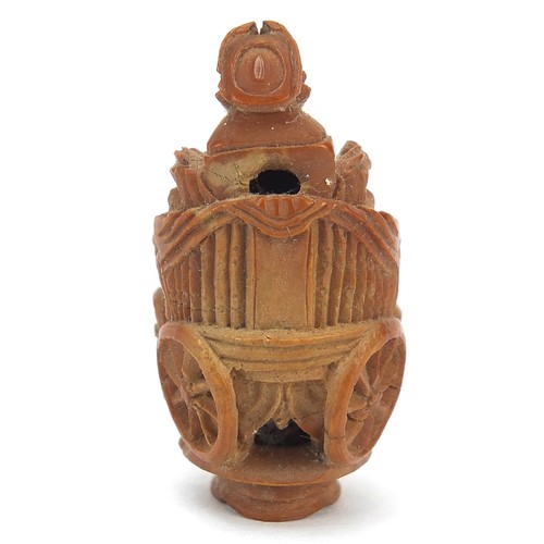 65 - Chinese objects to include a coquilla nut carved in the form of a cart being pulled by horses, white... 