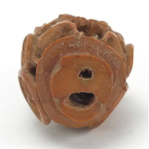 65 - Chinese objects to include a coquilla nut carved in the form of a cart being pulled by horses, white... 