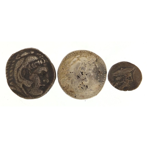 2509 - Two Greek silver Tetradrachm coins and one other, 34.8g, the largest 27mm in diameter