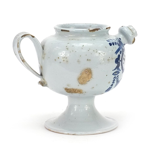 41 - 18th century Delft blue and white tin glazed drug jar with handle and spout, 18cm high
