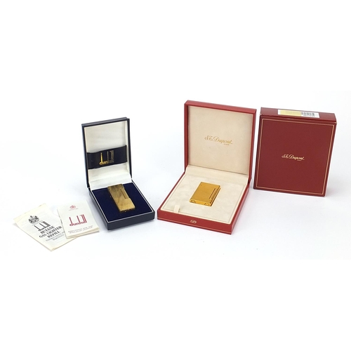 106 - Two boxed Dunhill and Dupont gold plated lighters, the largest 6.5cm in length